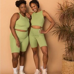 Girlfriend collective bike shorts in mantis